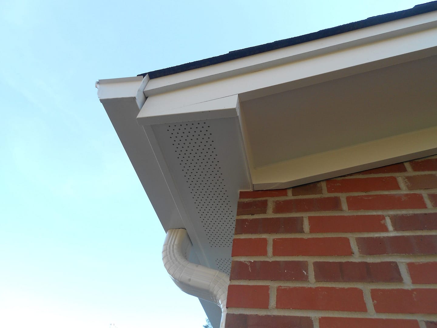 Newly installed gutters on a home in Brown County, WI by Gutter Tune Up, a trusted roofing contractor near me